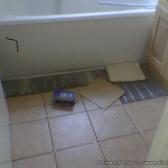 The tiles go down